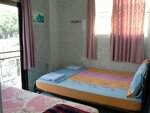 Standard Triple Room with Shared Bathroom в New Central Guesthouse