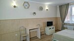 Четырехместный номер с общей ванной комнатой в Натали