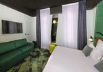 Улучшенный четырехместный номер в Hotel Tandem