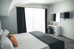 Стандартный трехместный номер в Motto Premium Hotel & SPA