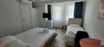 Трехместный номер «Делюкс», вид на город в Tenes Otel