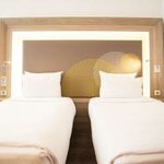 Номер стандарт улучшенный с 2 односпальными кроватями в Novotel