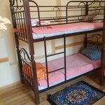 Кровать в 6-местном общем мужском номере в Хостел Турали