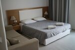 Улучшенный двухместный номер с 1 двуспальной кроватью в Petinaros Hotel