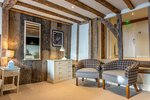 Улучшенный четырехместный номер в The Sun Inn