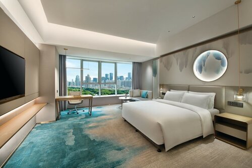 Улучшенный номер, 1 двуспальная кровать «Кинг-сайз» в Grand Skylight Garden Hotel Shenzhen