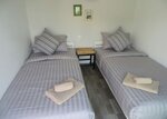 Стандартный двухместный номер с 2 односпальными кроватями, общая ванная комната в Non Du Lay Guesthouse