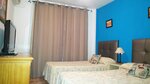 Стандартный двухместный номер с 1 двуспальной кроватью, 2 односпальные кровати в Hospederia V Centenario