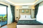 Номер «Джуниор», вид на горы в Gulluk Yali Boutique Hotel