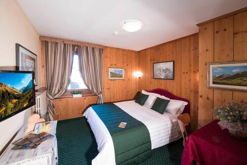 Трехместный номер в Alpina