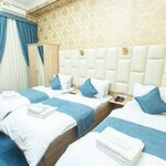 Номер стандарт с 3 односпальными кроватями в Mirzo Boutique Hotel