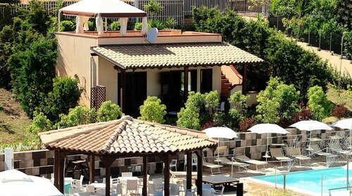 Эксклюзивная вилла, с выходом в сад в Hotel Costazzurra Museum & SPA