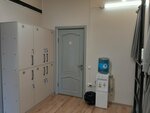 Кровать в общем 8-местном номере для мужчин и женщин в Берёзка