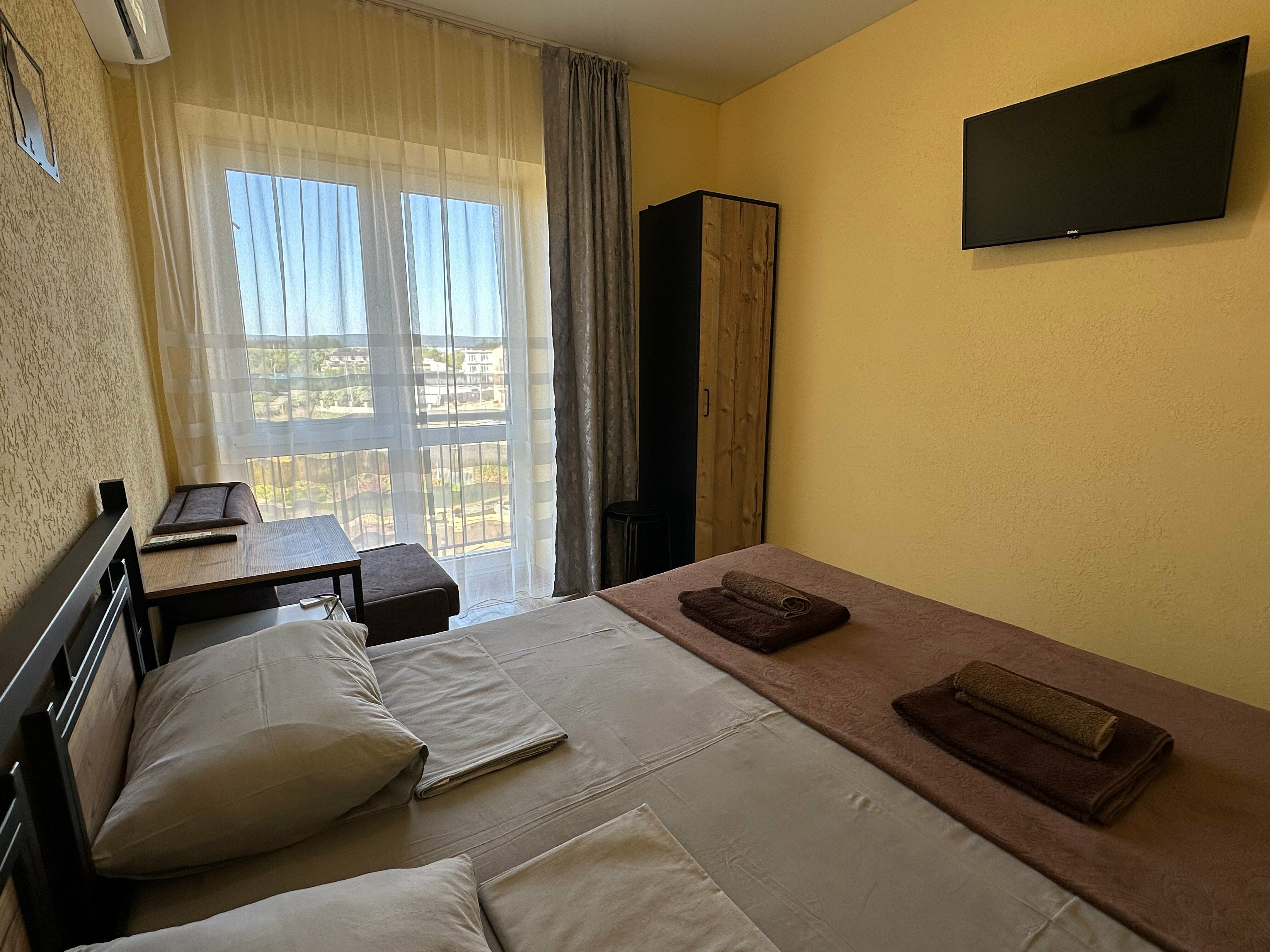 Двухместный номер с 1 кроватью или 2 отдельными кроватями и дополнительной кроватью