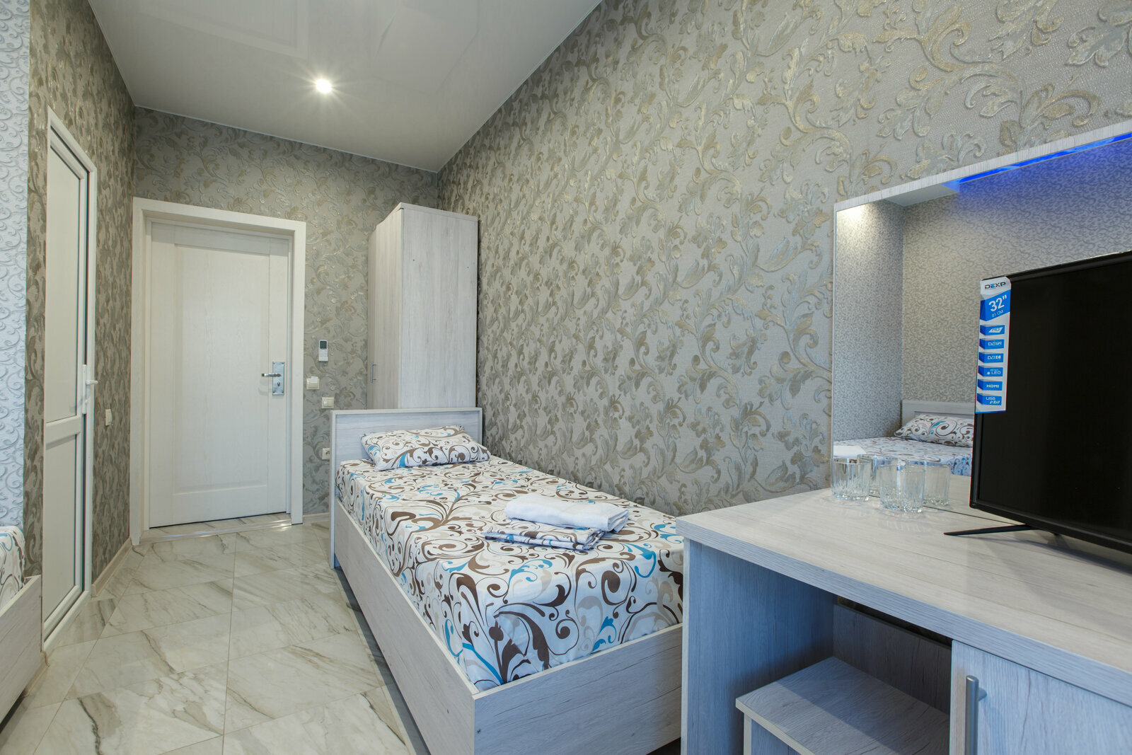 Трехместный номер Делюкс