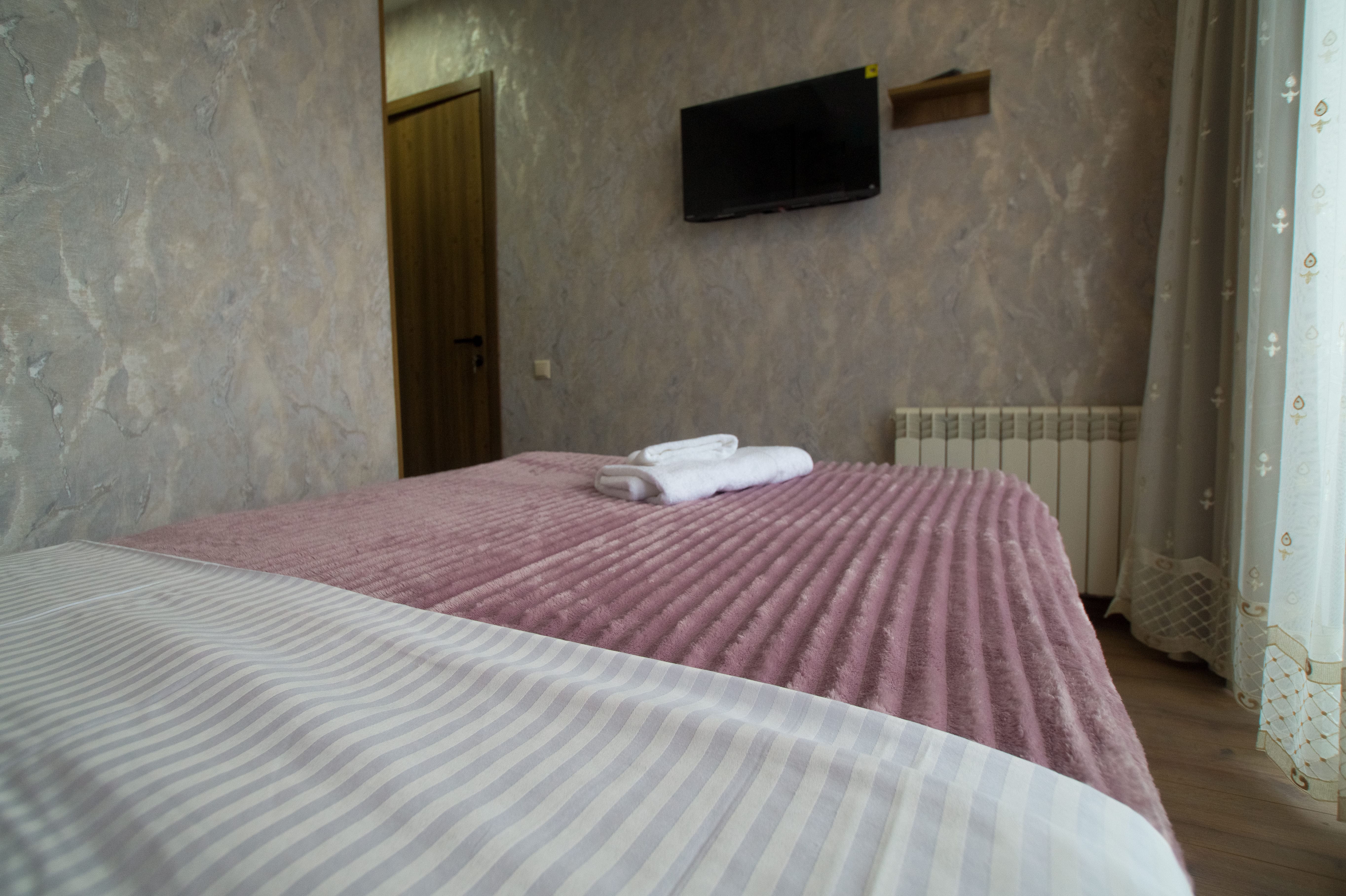 Одноместный номер Делюкс с балконом