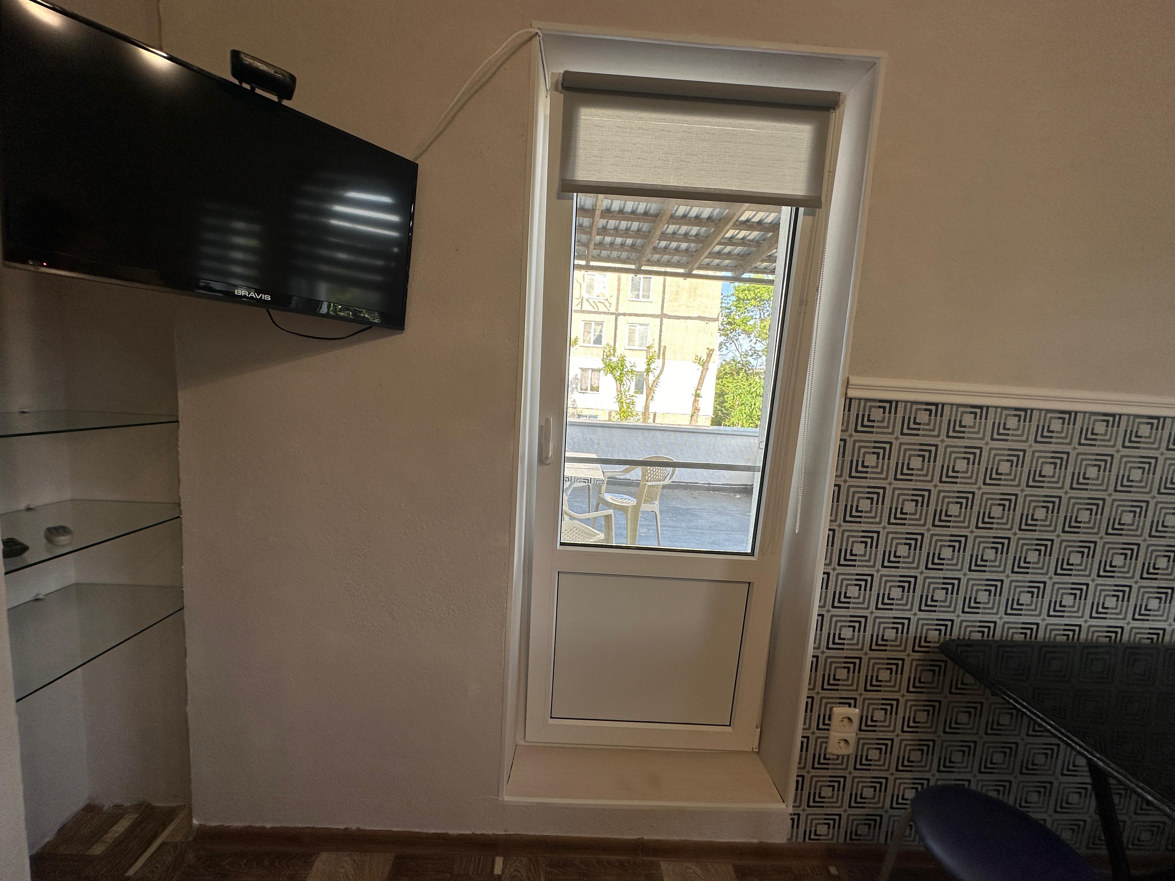 Трехместный номер с балконом