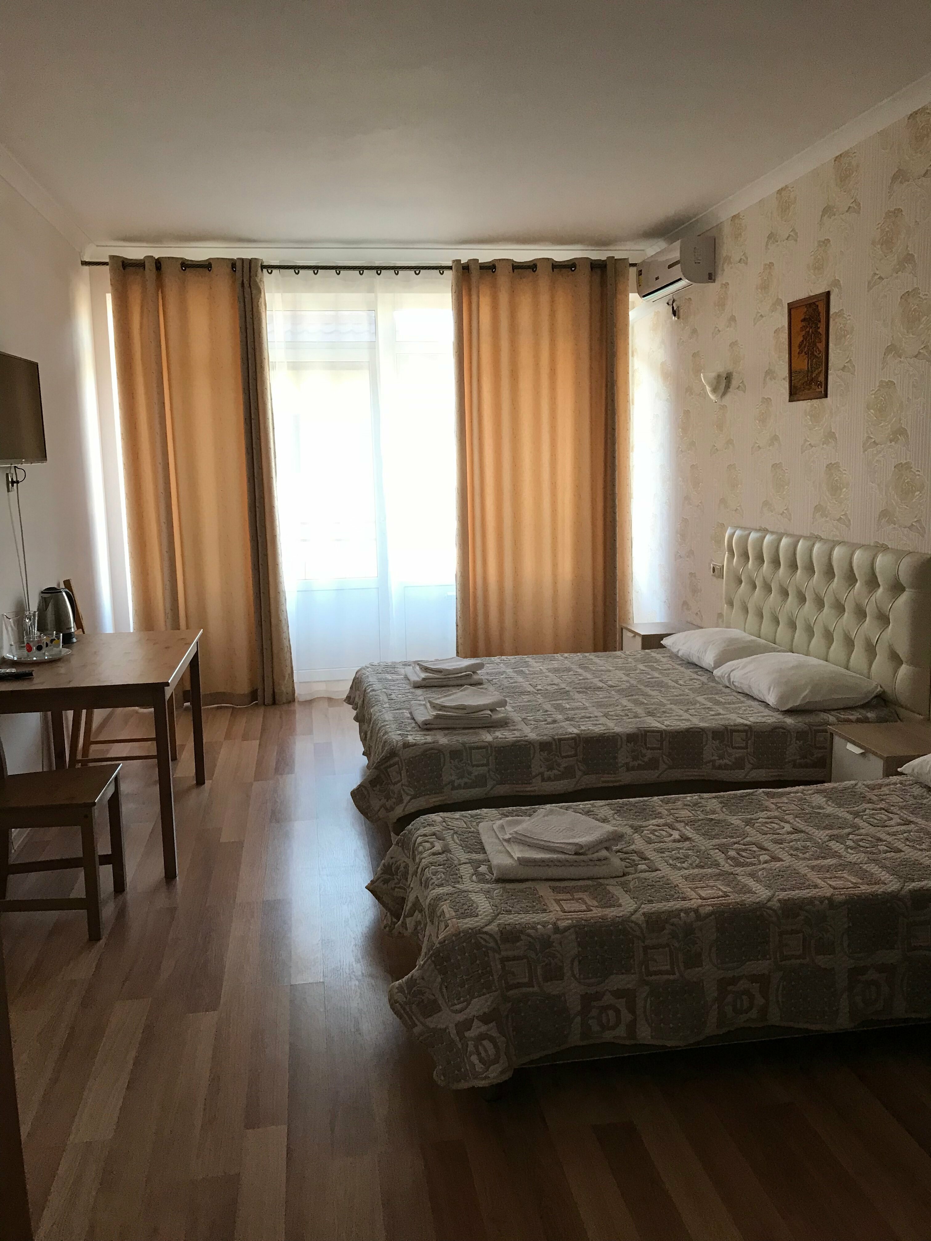 Улучшенный трехместный номер