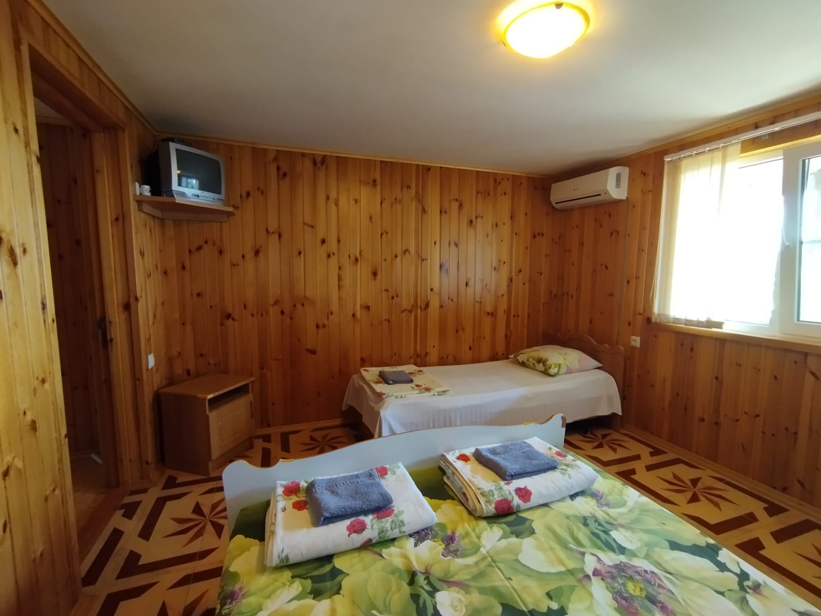 Улучшенный трехместный номер с видом на море