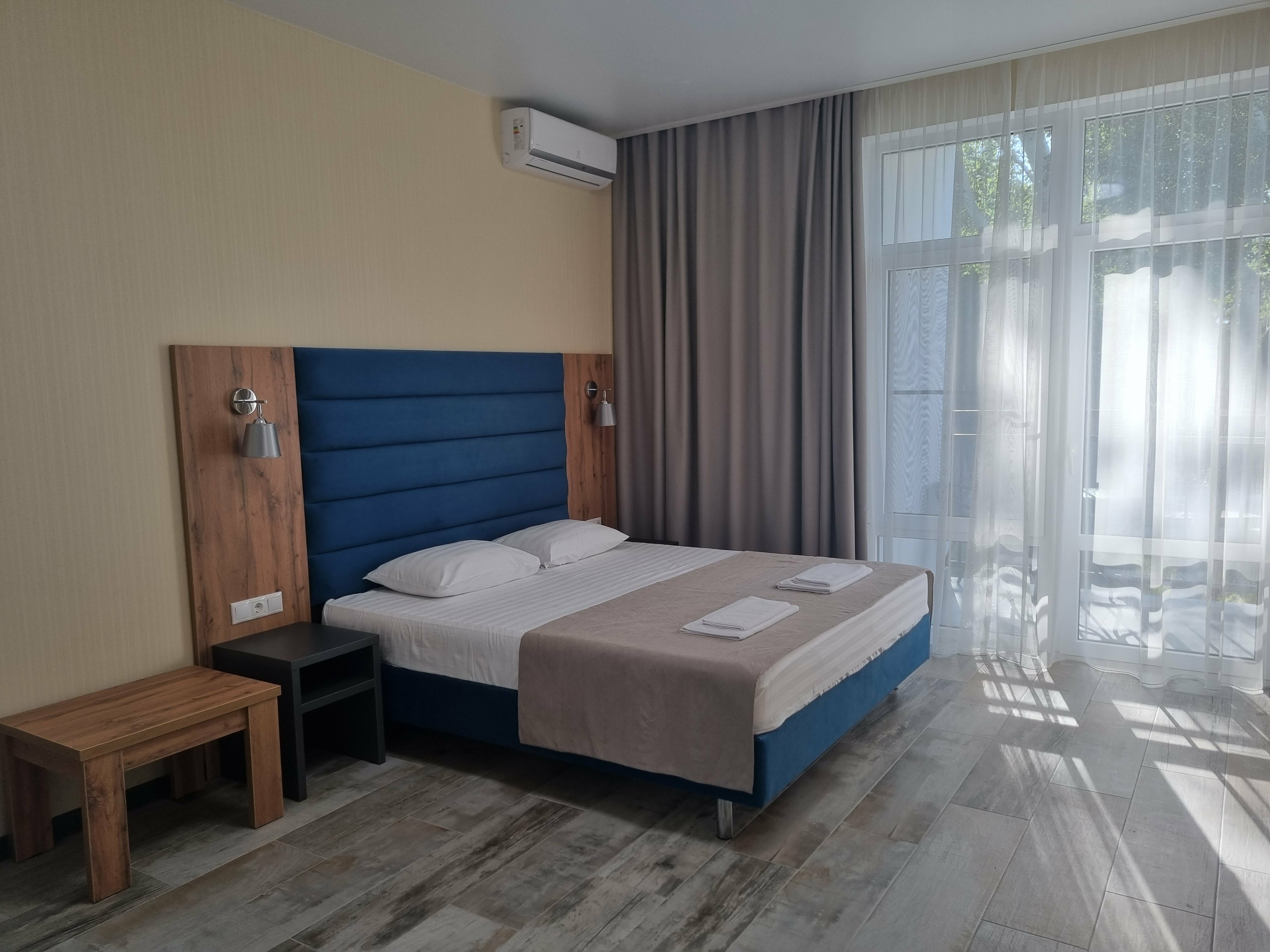 Улучшенный четырехместный номер