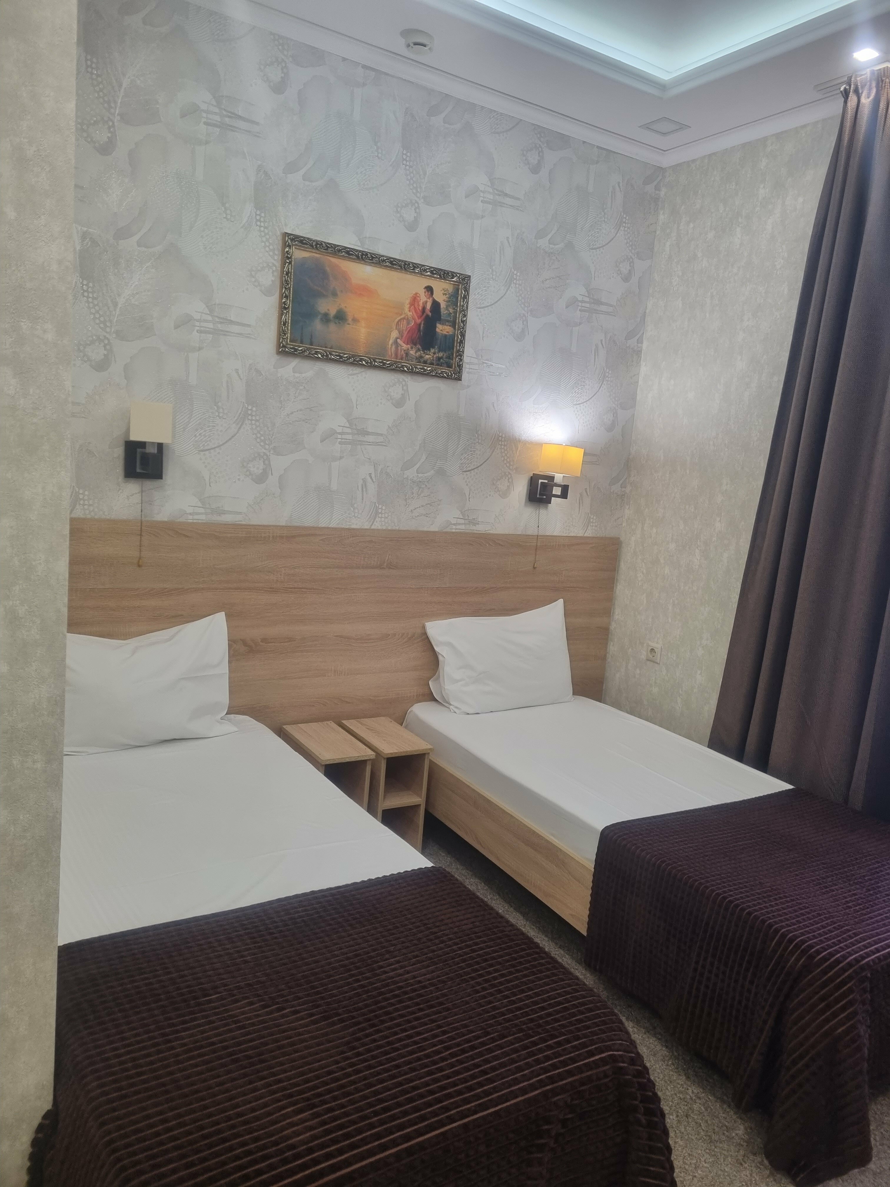 Двухместный номер с 2 отдельными кроватями и душем