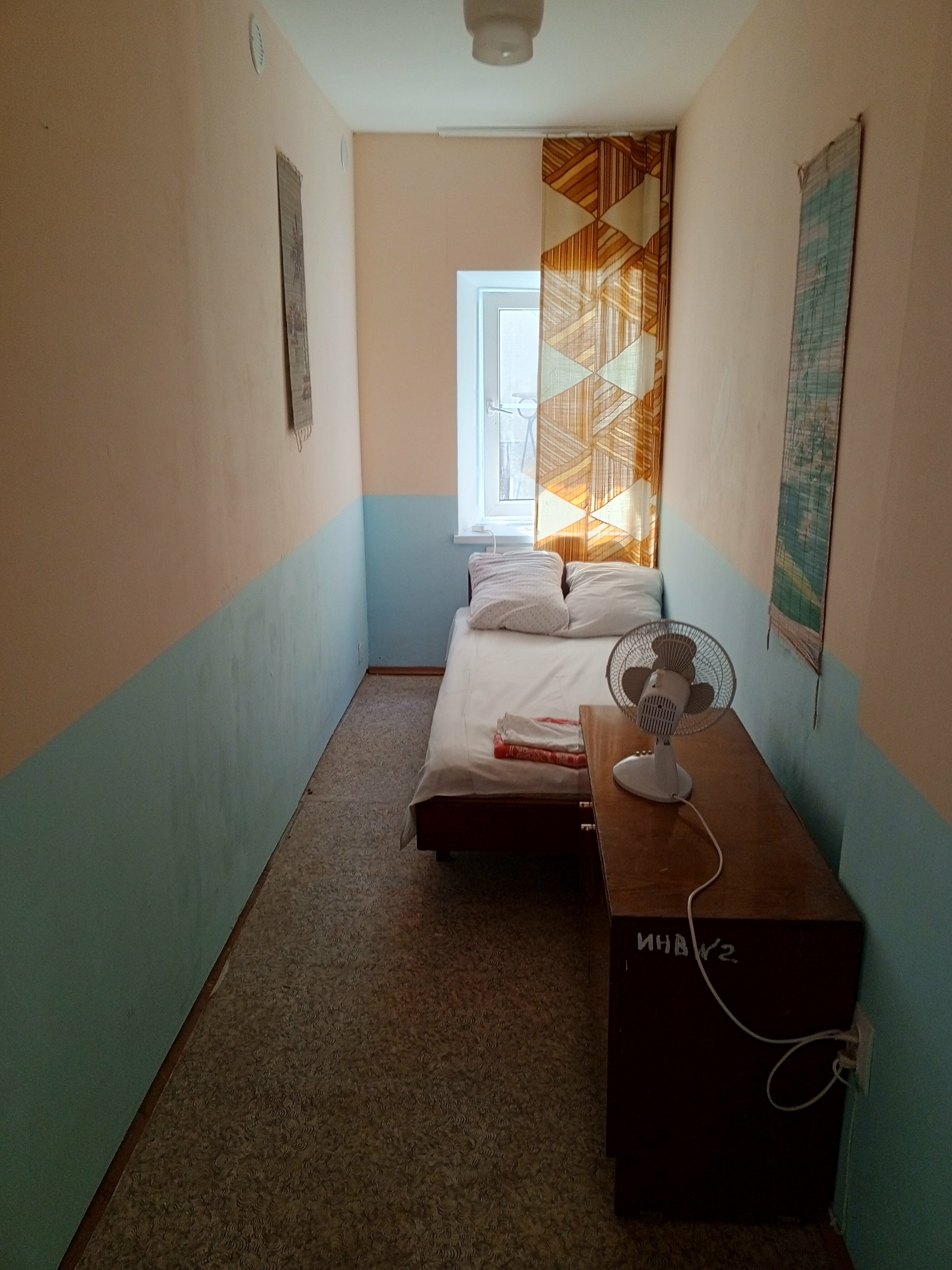 Одноместный номер с общей ванной комнатой