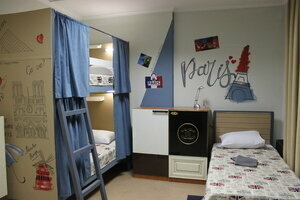 Кровать в общем 4-местном номере для мужчин и женщин