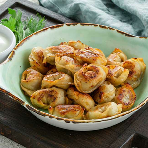 Жареная чучвара с ягнёнком (со сметаной)