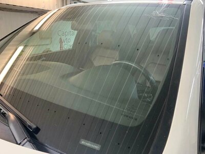 Нанесение покрытия антидождь на стёкла авто