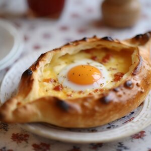 Хачапури по-аджарски (лодочка с яйцом внутри)