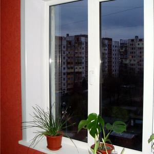 Пластиковое окно кирпичный дом