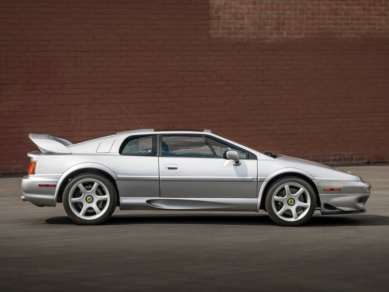 Сбоку