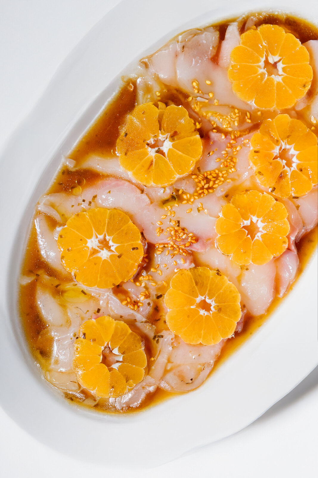 Крудо из дорады с мандарином и цитрусовым понзу