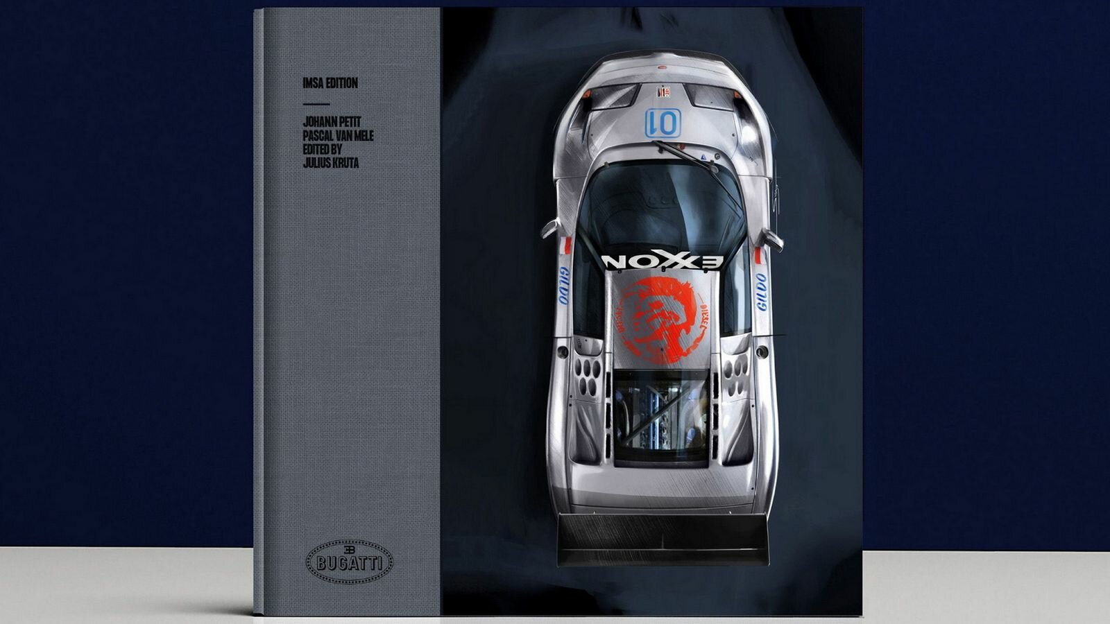 Первый экземпляр книги об истории Bugatti EB110 продан за 46 тысяч долларов