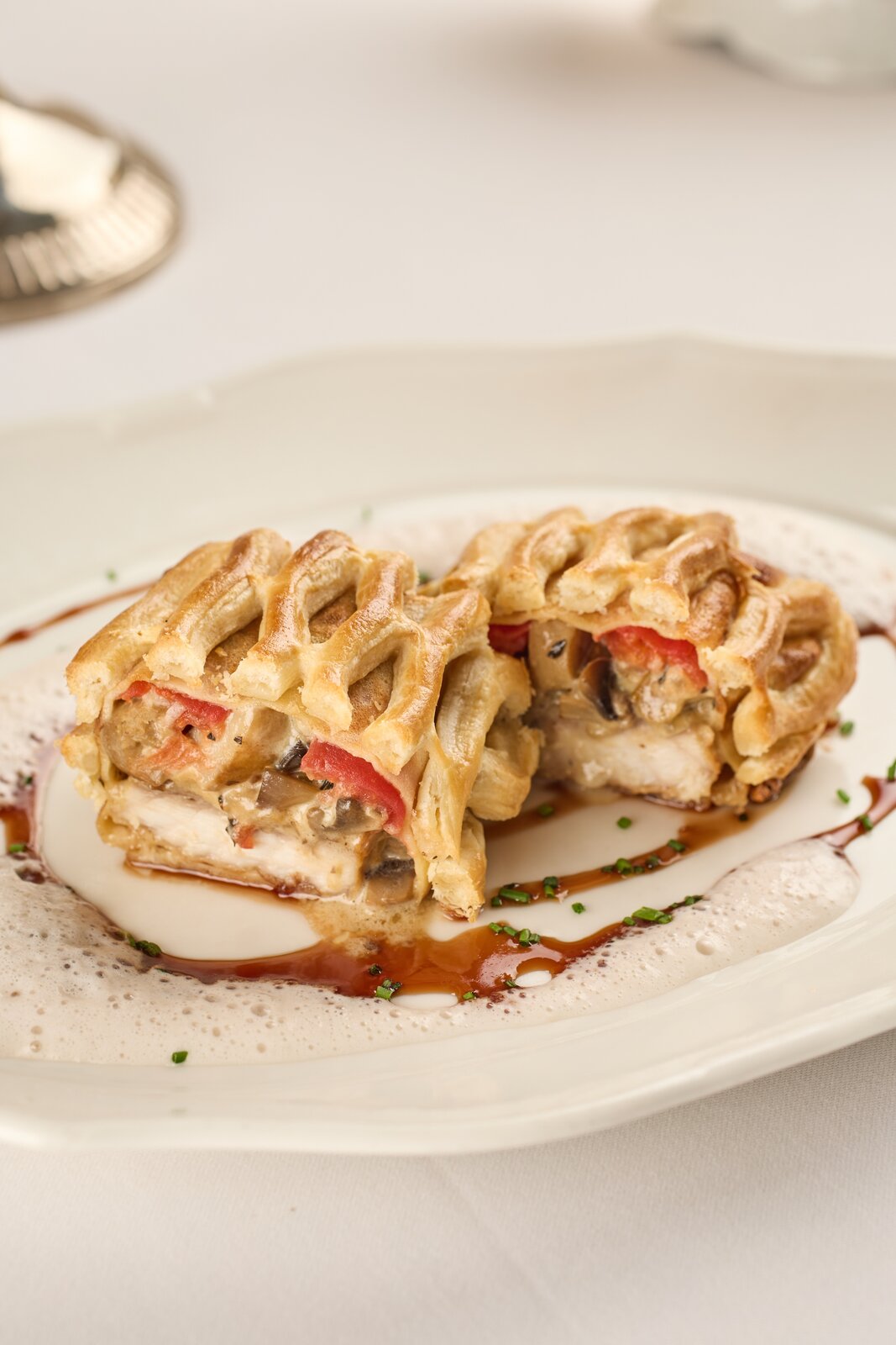 Перепечина из осетрины и грибов с гранатовым соусом