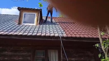 Покраска крыши дома в Домодедово.