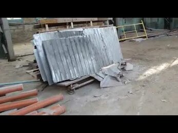 Утепление потолка в ангаре по П-образным плитам.
