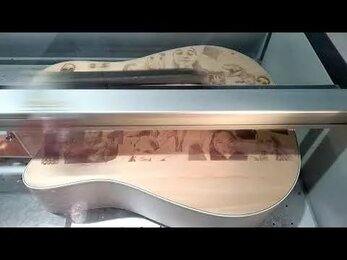Гравировка гитары на Trotec Speedy 400