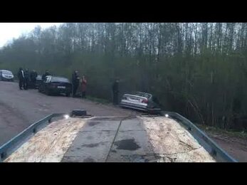 Эвакуация БМВ из канавы