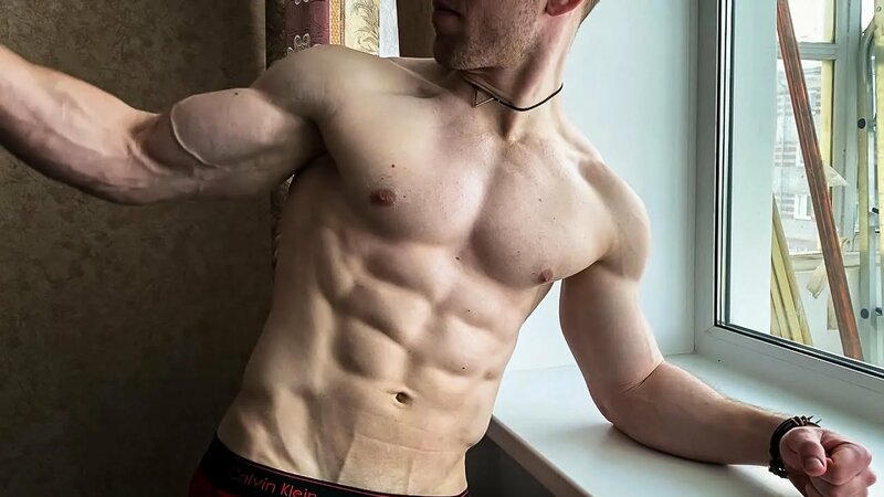 Handsome Russian Boy with an Aesthetic Relief Body Flexing and Enjoys ...