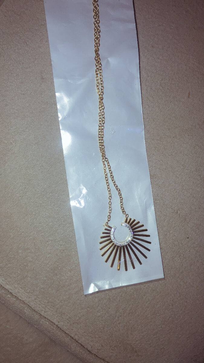 Collier pendentif soleil doré