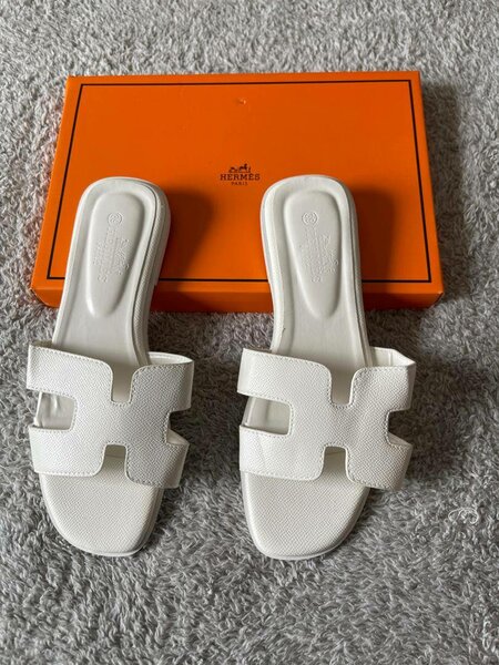 white Hermes slippers