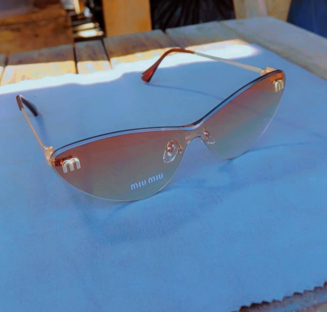 Lunettes de soleil Miu Miu