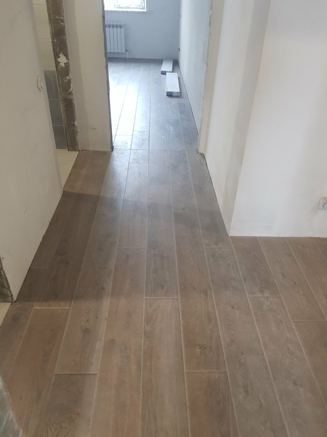 укладка ламината, укладка ламината по диагонали, ламинат, линолеум, укладка ламината иркутск