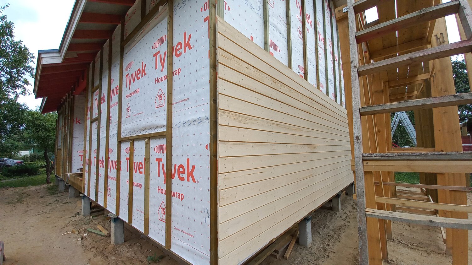 каркасный дом, обшивка каркаса имитацией бруса, утепление дома из бруса 150х150 снаружи под сайдинг, утепление дома из бруса снаружи под сайдинг, обшивка каркаса