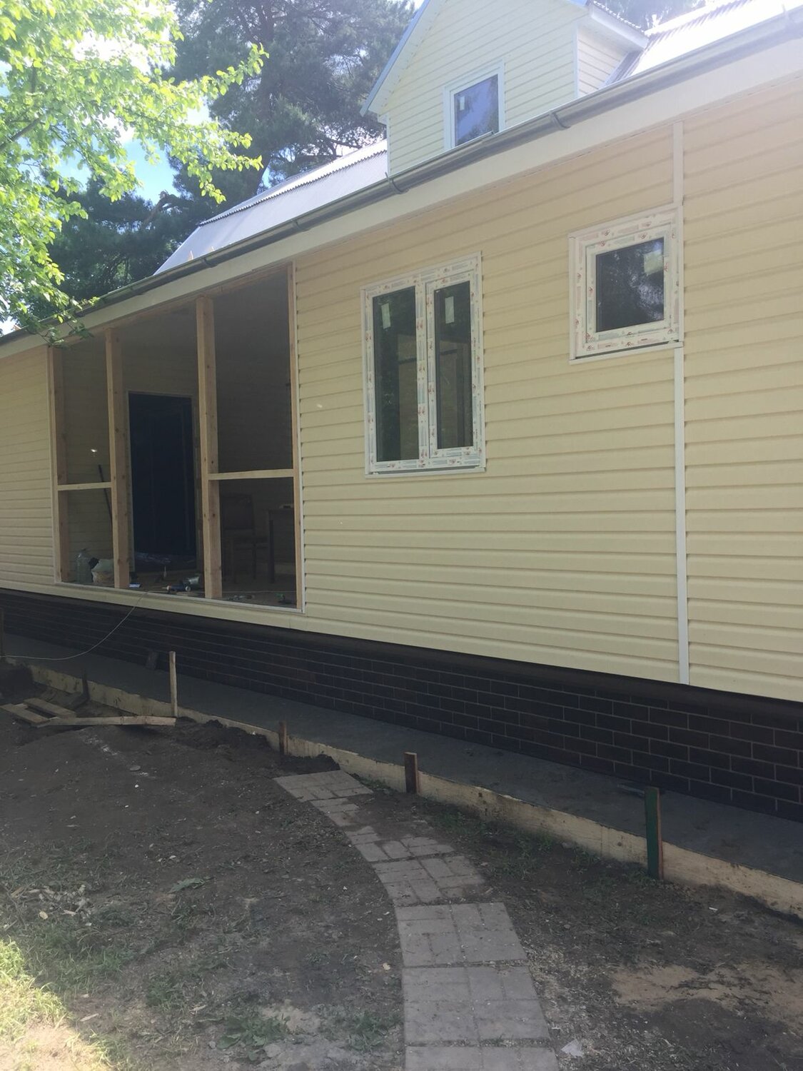 Монтаж фасада из винилового сайдинга