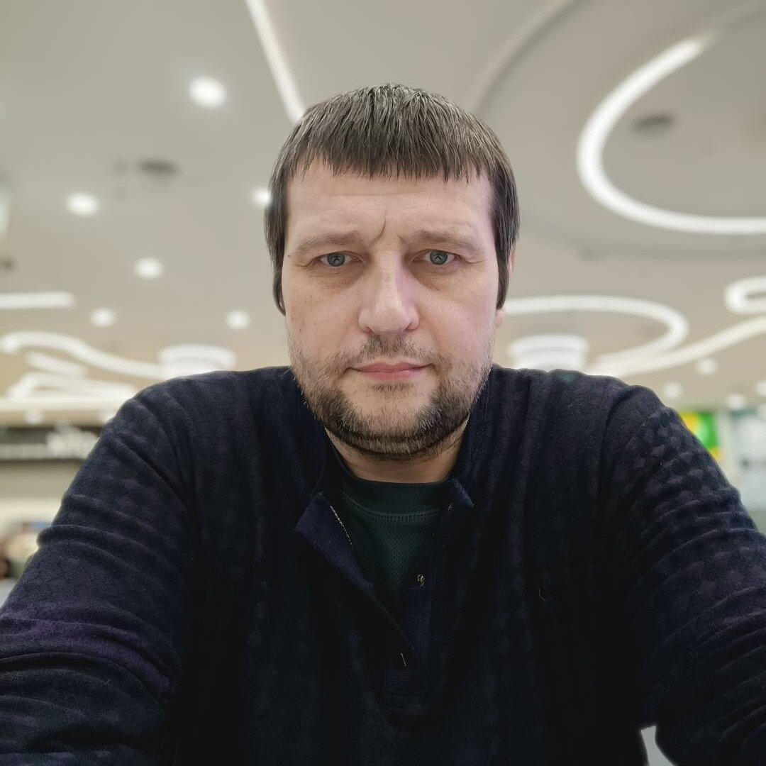 Александр Олейник