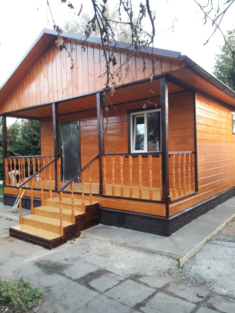 Покраска деревянного дома