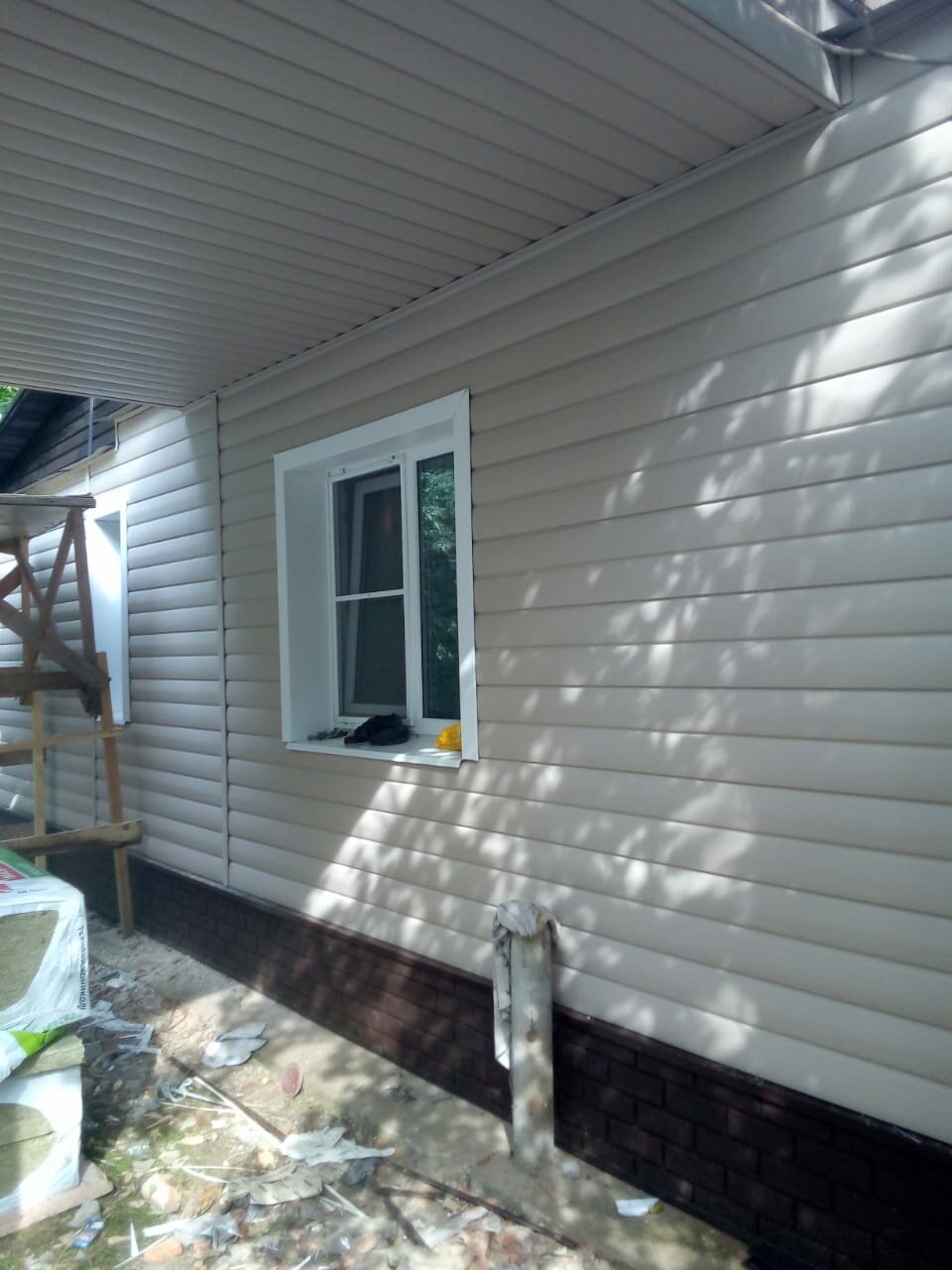 Монтаж фасада из винилового сайдинга