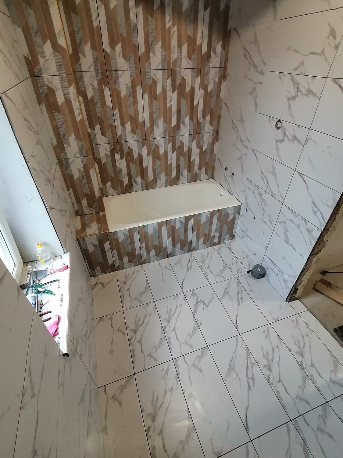 укладка керамогранита 1200х200, укладка керамогранита 60*60 merida, облицовка плиткой по диагонали, укладка керамогранита под 45 градусов, плитка под углом